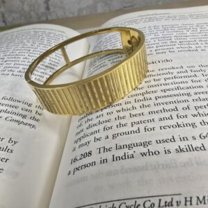 Mesh-patterned gold cuff